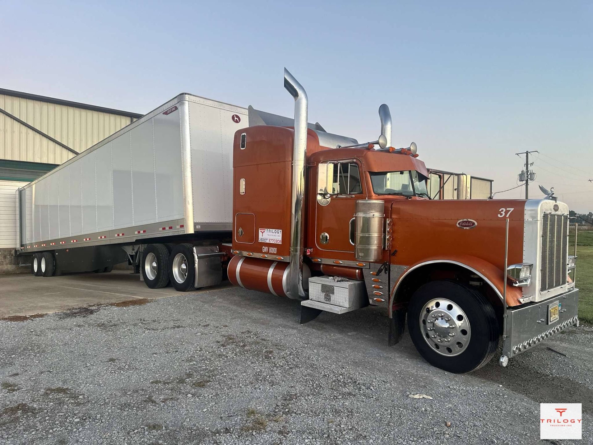 Owner operator Peterbilt with Trilogy decal